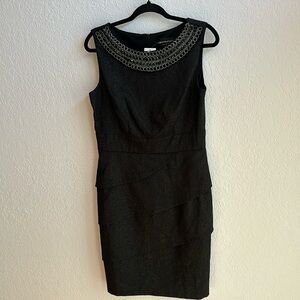 Black sleeveless dress with silver and black embellishments
